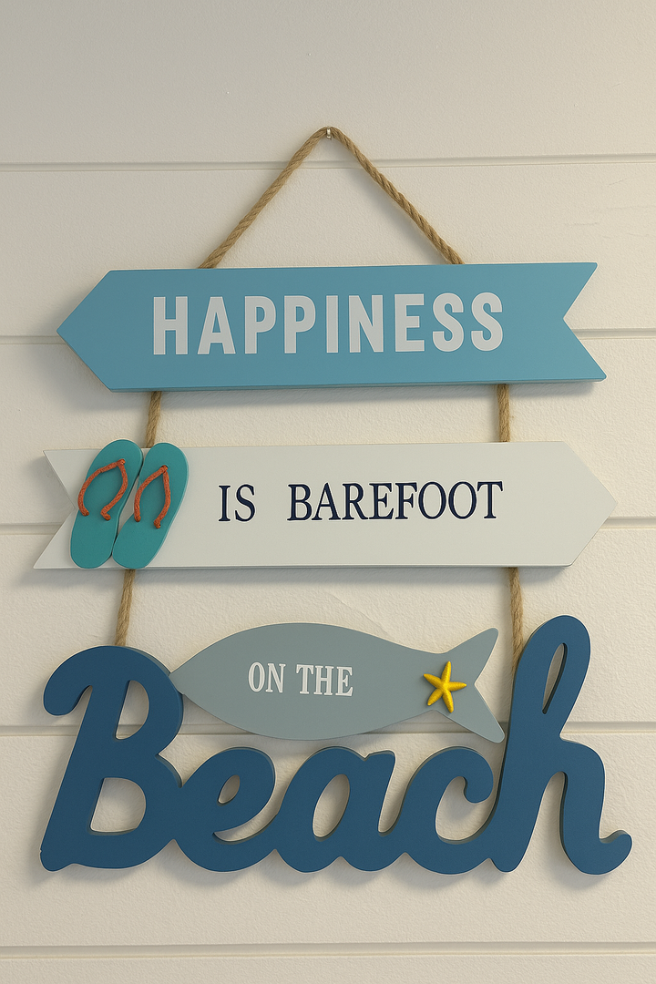 Wooden beach-themed wall sign with arrows, flip-flops, and fish, featuring the phrase "Happiness is Barefoot on the Beach."