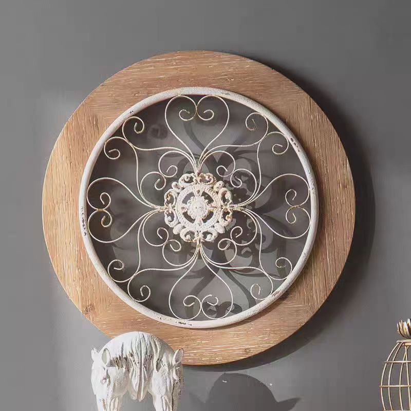 Round Wall Decor with Ornate Ironwork and Wooden Frame