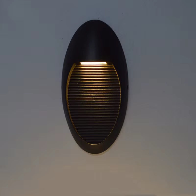 Sleek Oval Outdoor Wall Light with Downward Glow