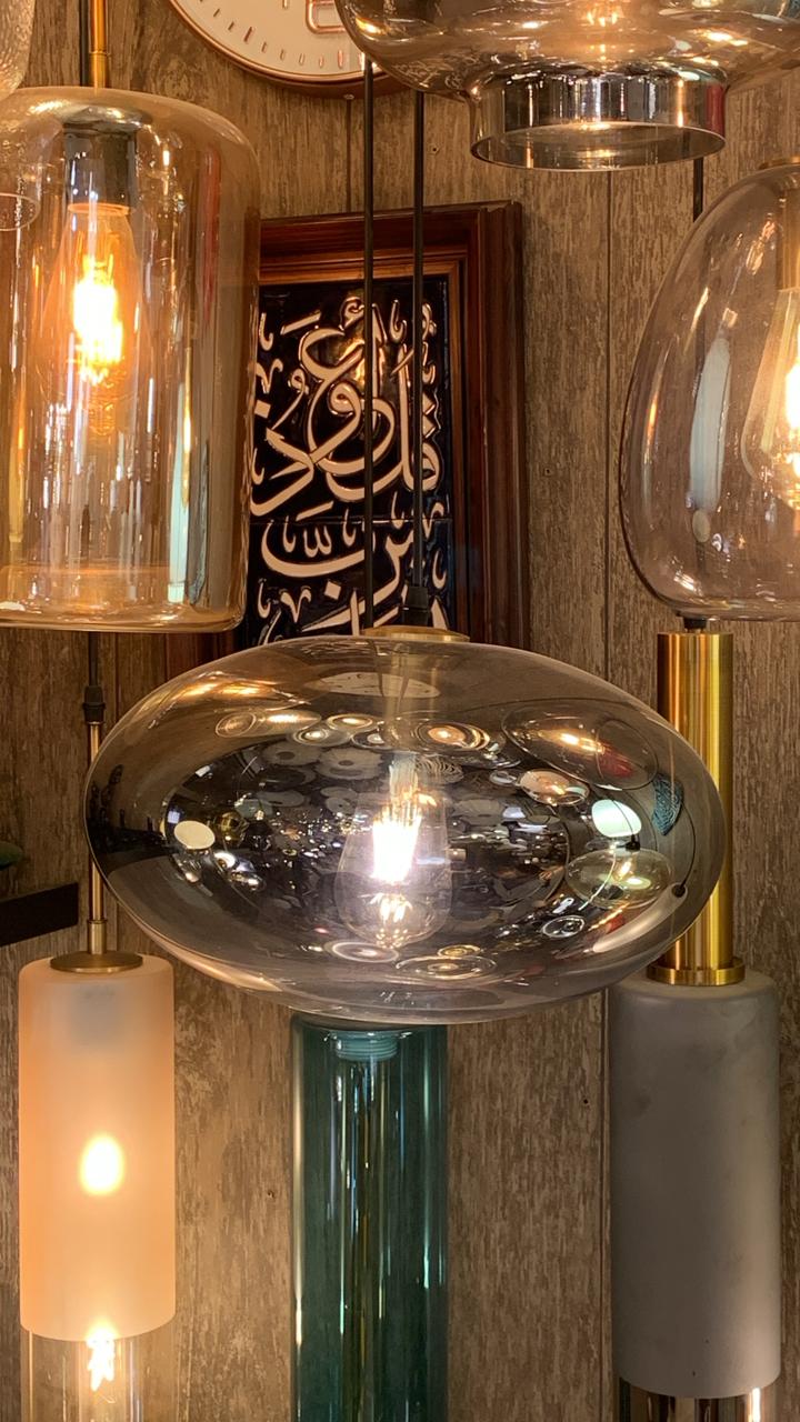 Modern Amber Glass Pendant Light with Sleek Design