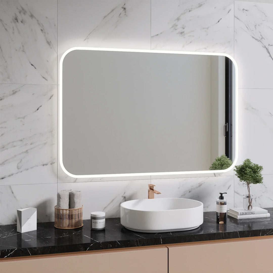 Curved rectangular LED bathroom mirror with soft border light on marble wall