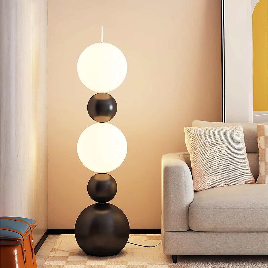 Modern floor lamps with sleek designs in a home setting
