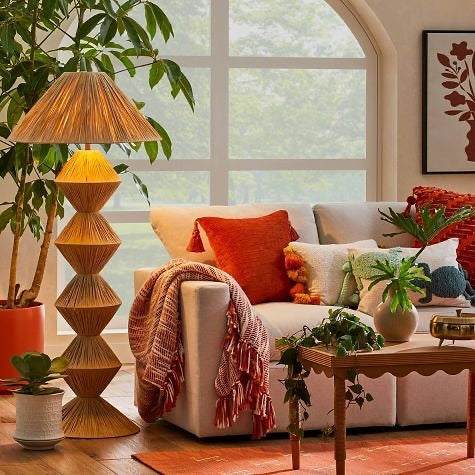 Spacious living and dining room with modern furniture and natural lighting