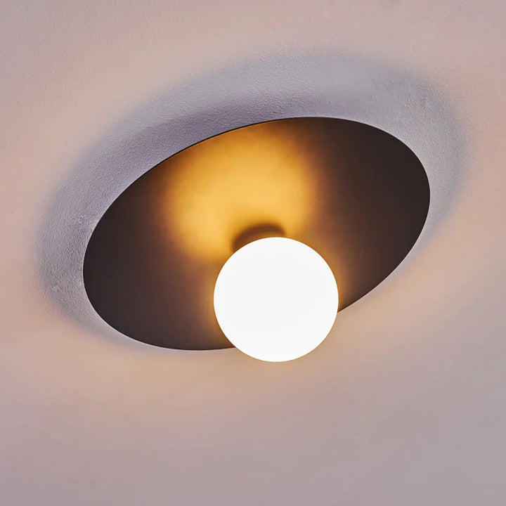 Modern Globe Ceiling Light with Black Disc Design