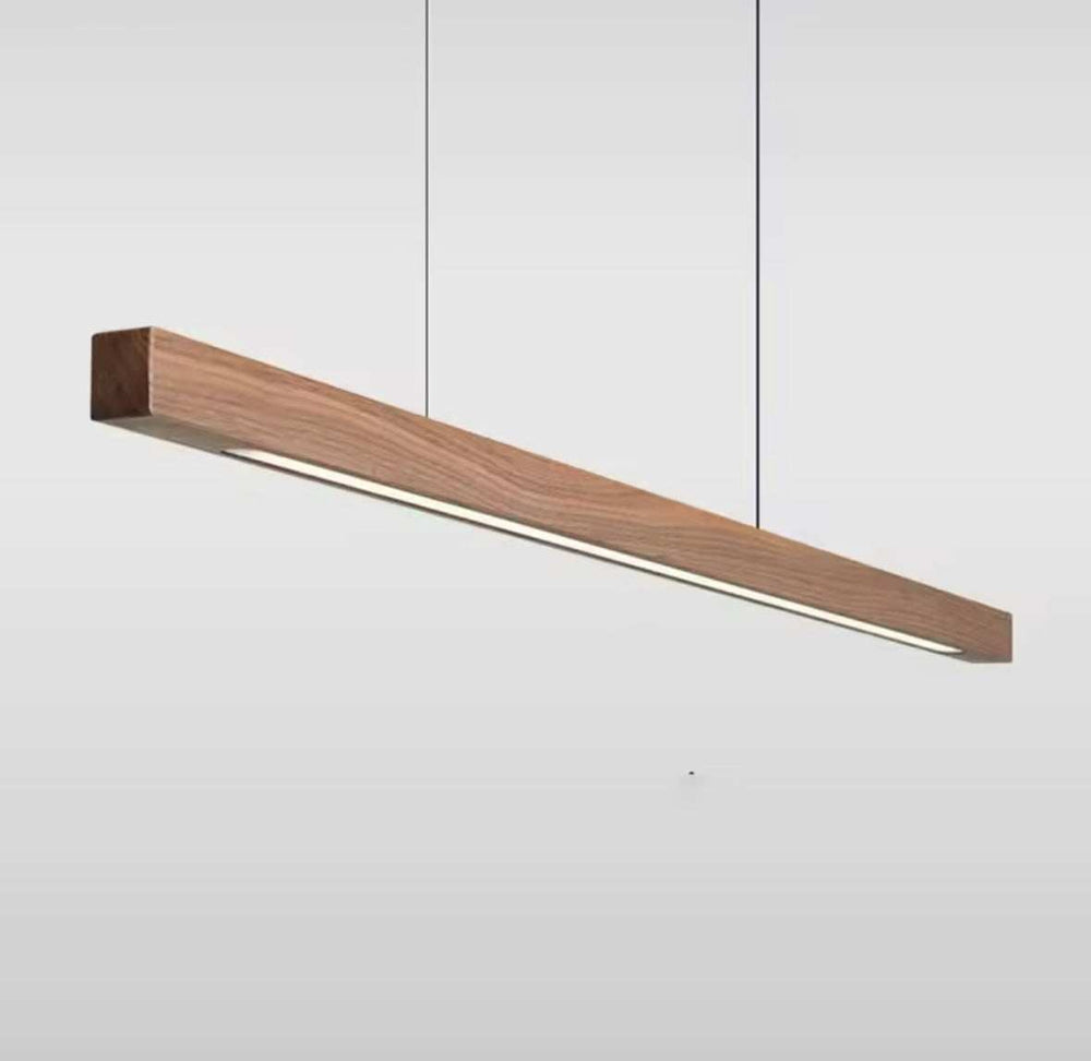 Modern Wooden Linear Pendant LightModern Wooden Linear Pendant LightIlluminate your space with this sleek and modern Wooden Linear Pendant Light. Crafted from natural wood with integrated LED lighting, this fixture adds warmth and elPendant LightingWadi Home
