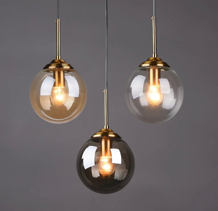 Modern 5-Light Globe Pendant Light with Smoked Glass and Brass Finish