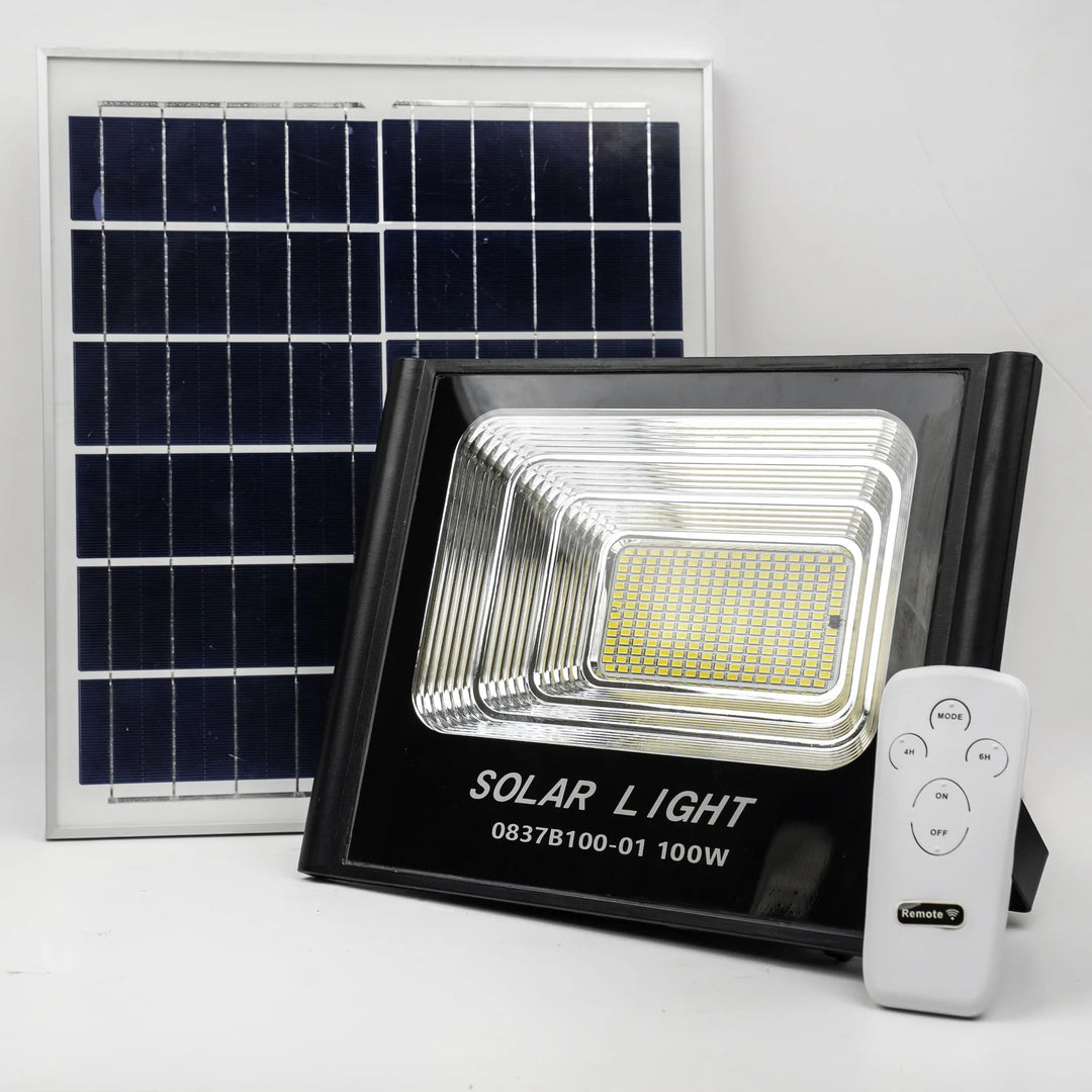 Black solar LED floodlight with separate solar panel and white remote control