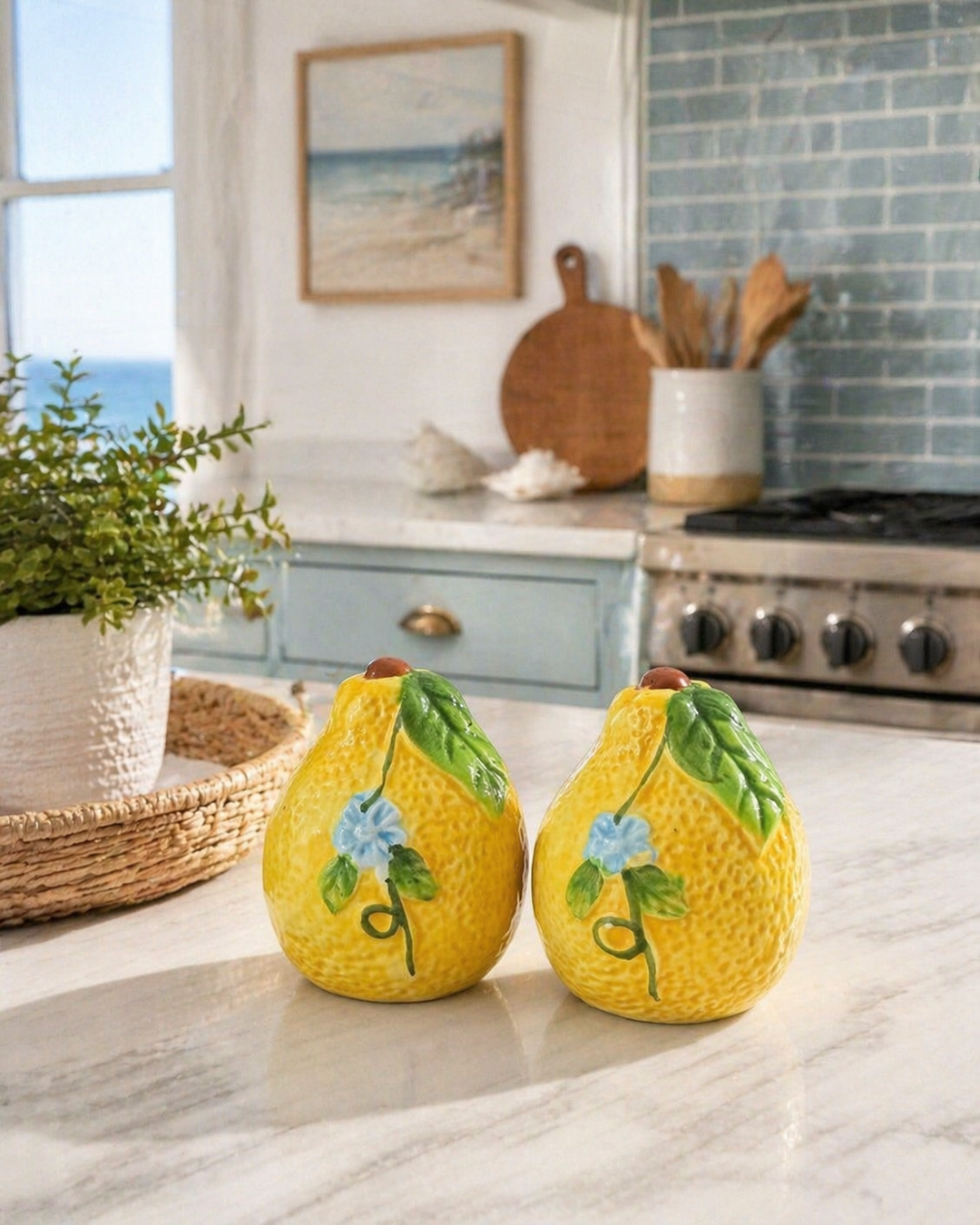 Glossy ceramic lemon-shaped salt and pepper shaker set with floral detail and coastal summer vibe