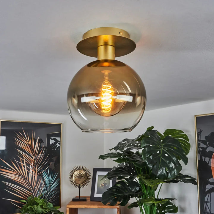 Modern Amber Glass Globe Ceiling Light with Brass Base