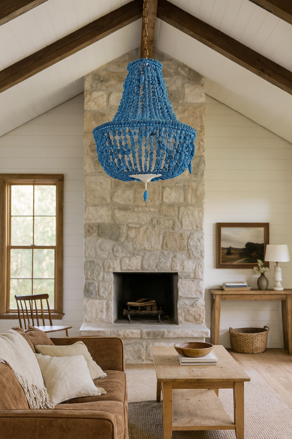 Blue beaded chandelier hanging in modern living room