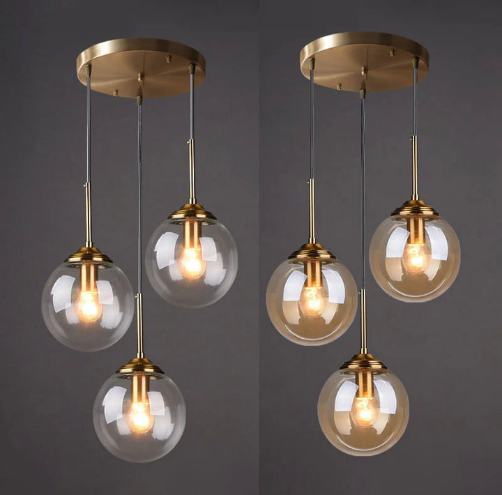 Modern 5-Light Globe Pendant Light with Smoked Glass and Brass Finish