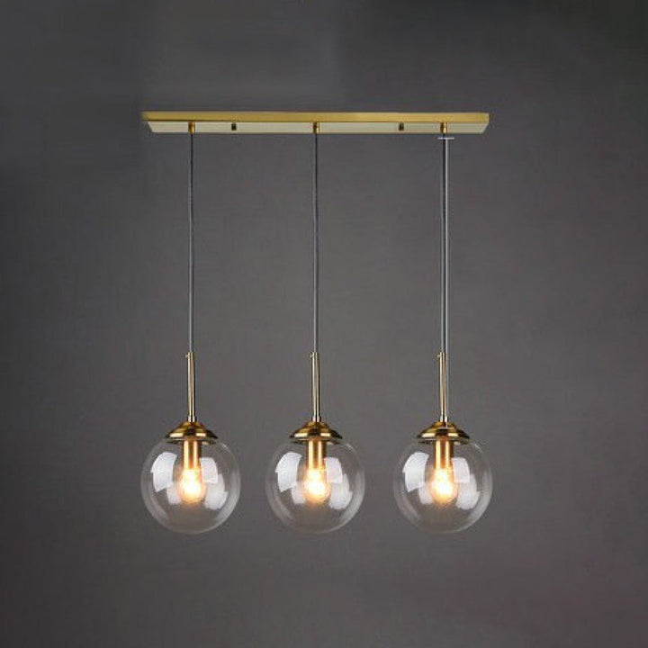 Modern 5-Light Globe Pendant Light with Smoked Glass and Brass Finish