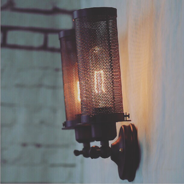 Industrial Wall Sconce with Perforated Cylindrical Shades