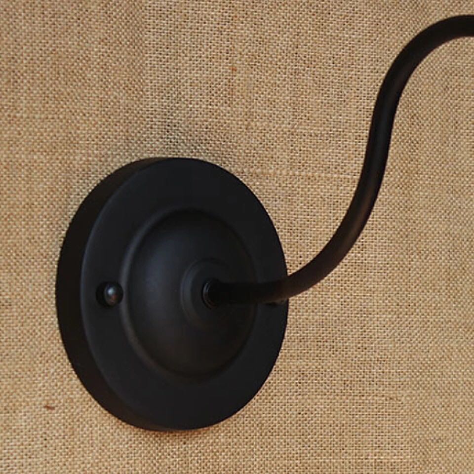 Industrial Wall Sconce with Black Curved Design