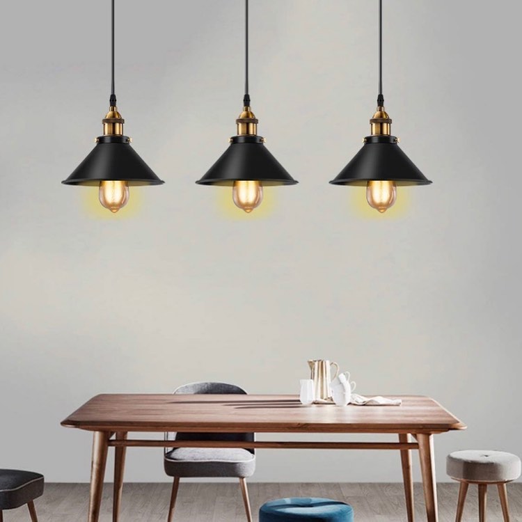 Industrial Pendant Lights with Black Shades and Brass Accents