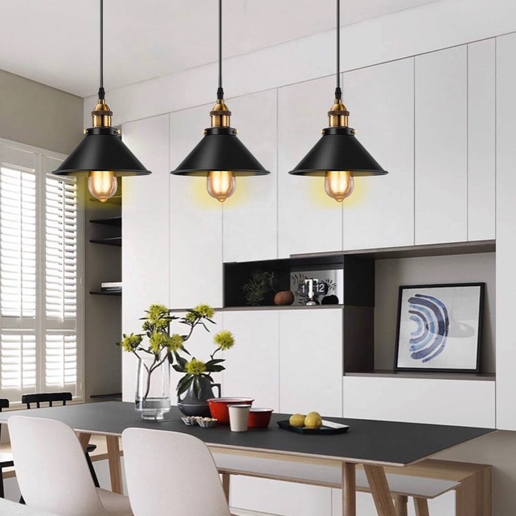 Industrial Pendant Lights with Black Shades and Brass Accents