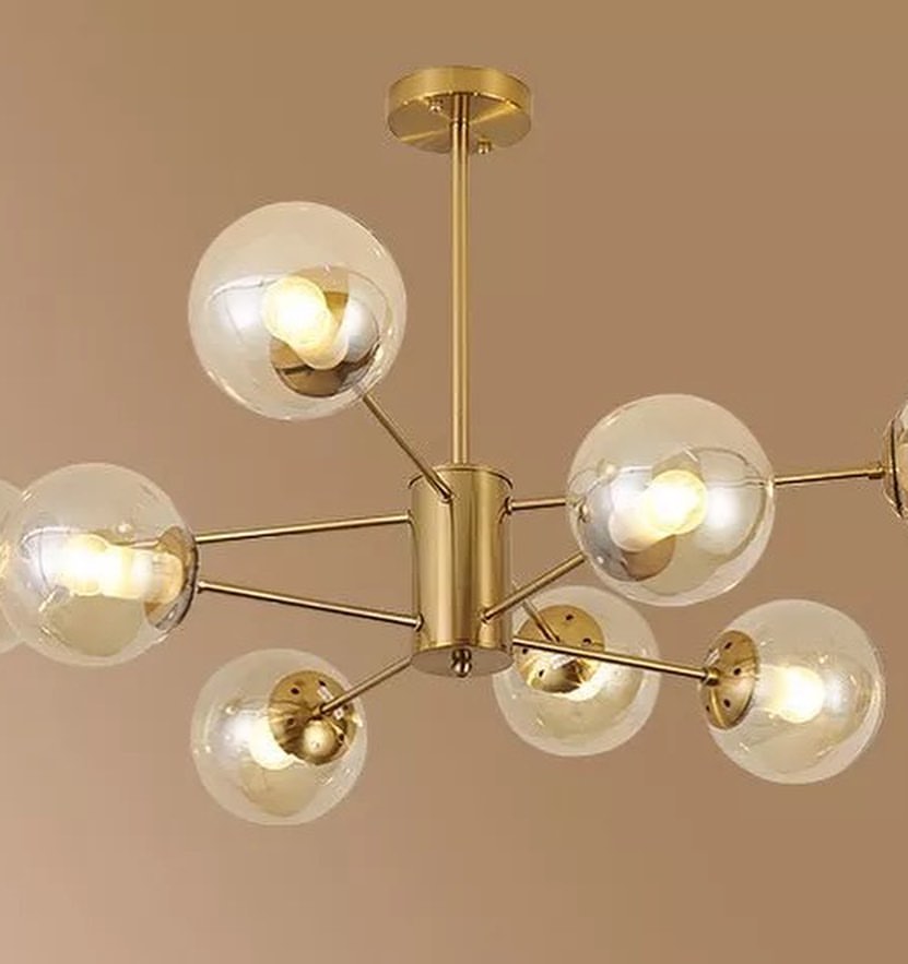 Modern Gold Chandelier with Glass Globe Shades