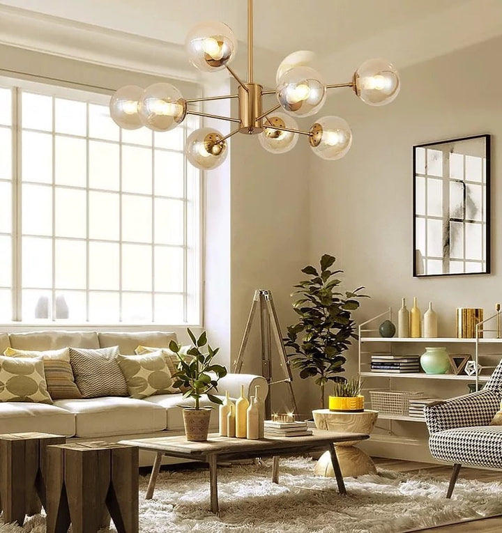 Modern Gold Chandelier with Glass Globe Shades