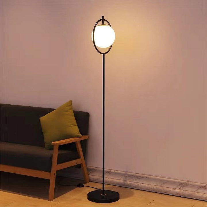 Modern Floor Lamp with Orbital Glass Shade