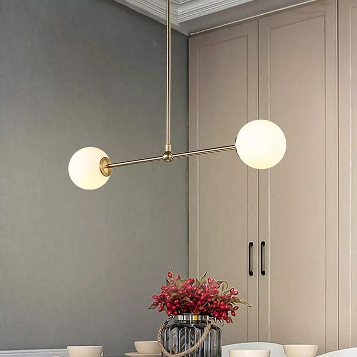 Modern Gold Pendant Light with White Globe Shades