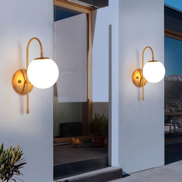 Modern Wall Sconce with Gold Finish and Globe Shade