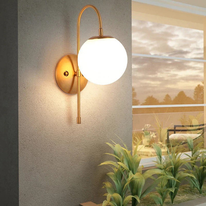 Modern Wall Sconce with Gold Finish and Globe Shade