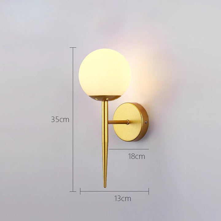 Modern Wall Sconce with Sleek Gold Design and Globe Shade