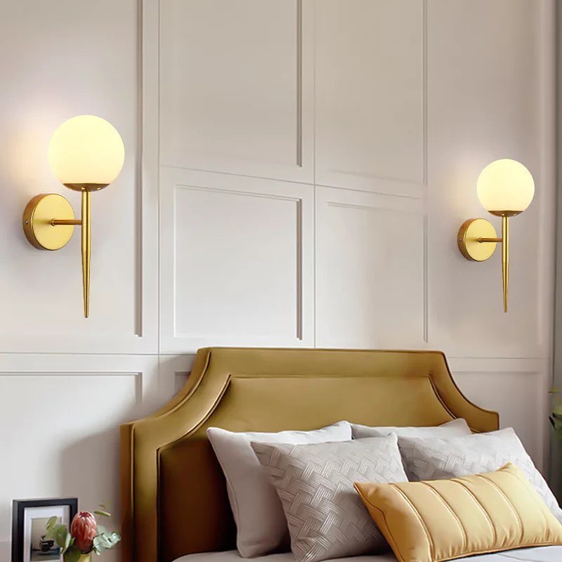 Modern Wall Sconce with Sleek Gold Design and Globe Shade