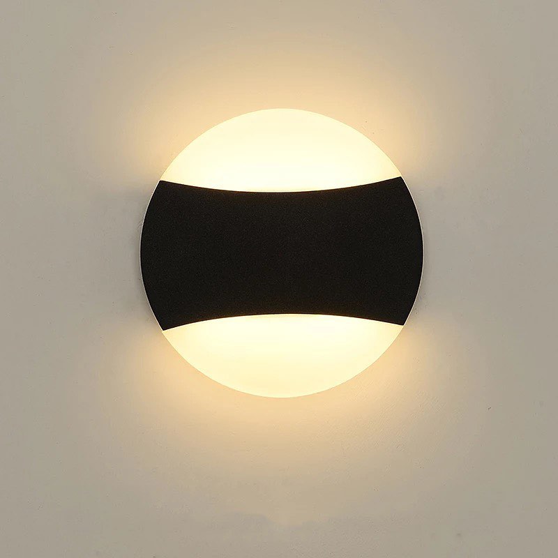 Modern LED Wall Light with Circular Design and Black Accents