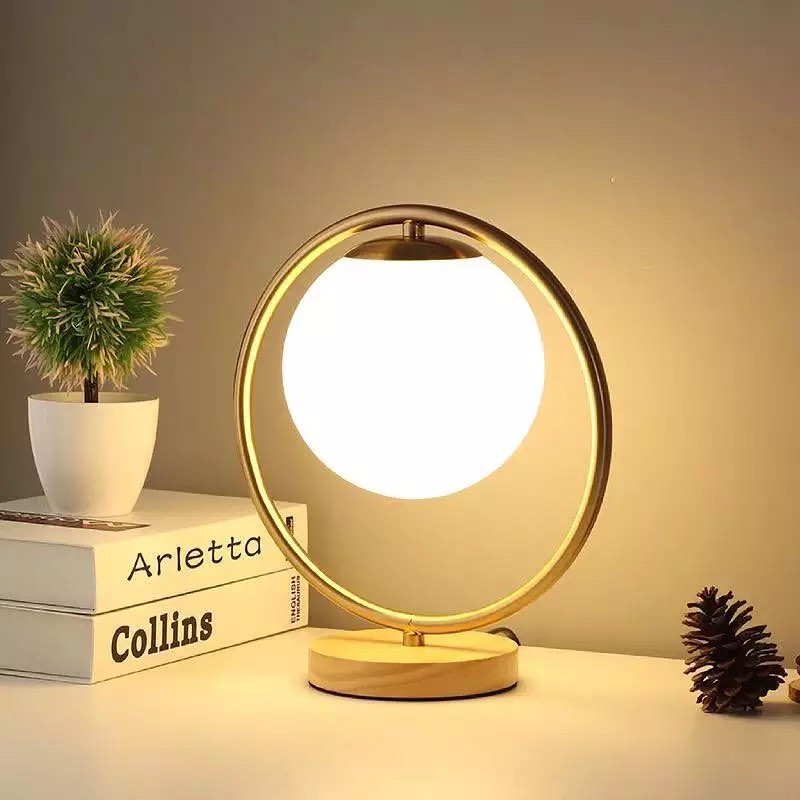 Modern Table Lamp with Circular Gold Frame and White Globe Shade