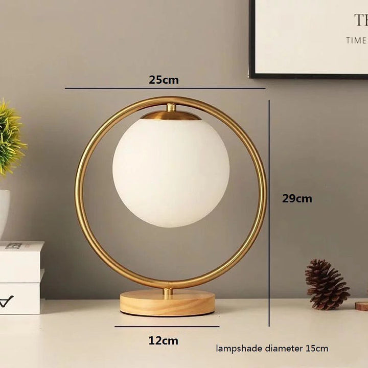 Modern Table Lamp with Circular Gold Frame and White Globe Shade