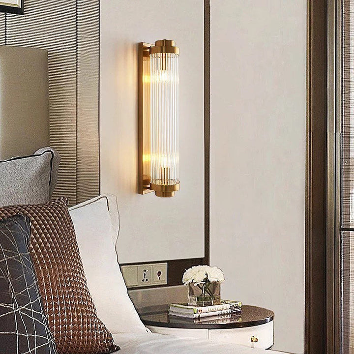 Modern Gold Wall Sconce with Glass Filament Design