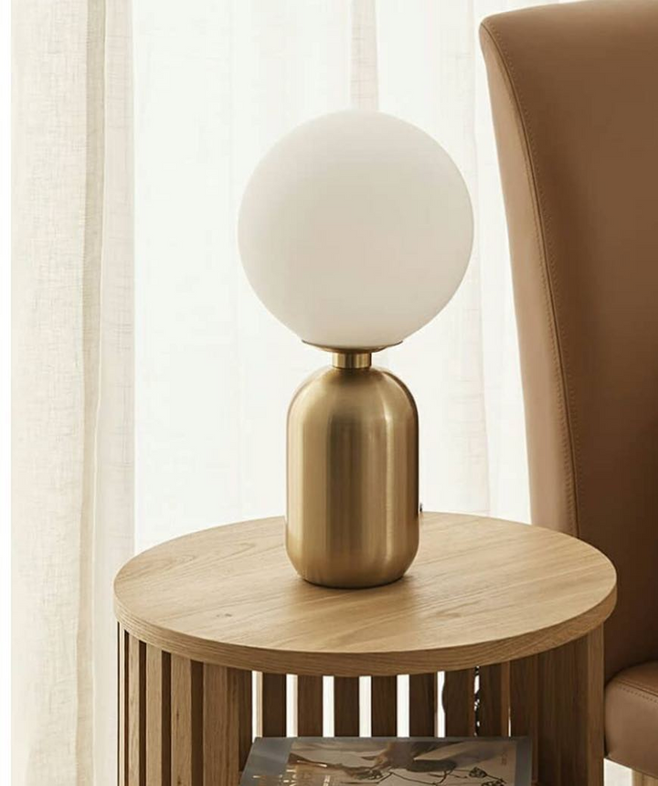 Modern Table Lamp with White Globe Shade and Brass Base