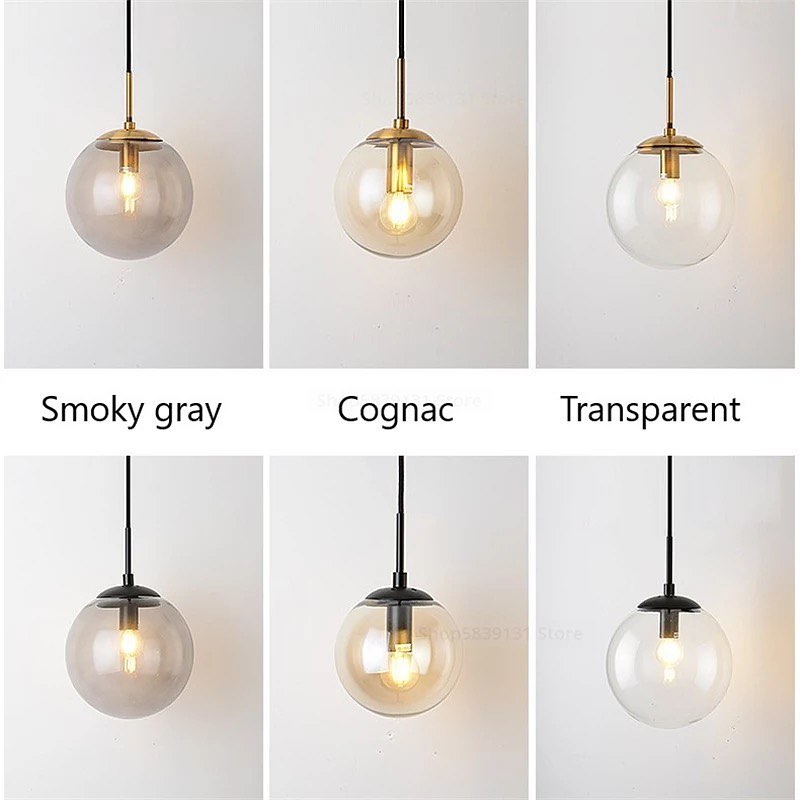 Modern Wall Light with Gold Finish and Glass Globe Shade