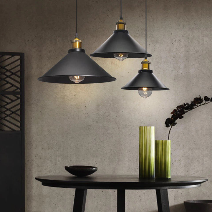 Industrial Pendant Lights with Black Shades and Gold Accents