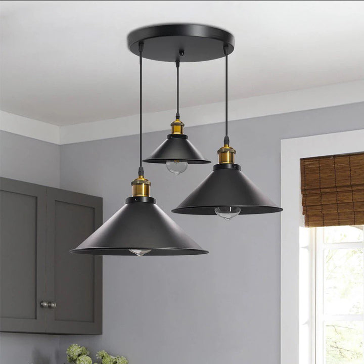 Industrial Pendant Lights with Black Shades and Gold Accents