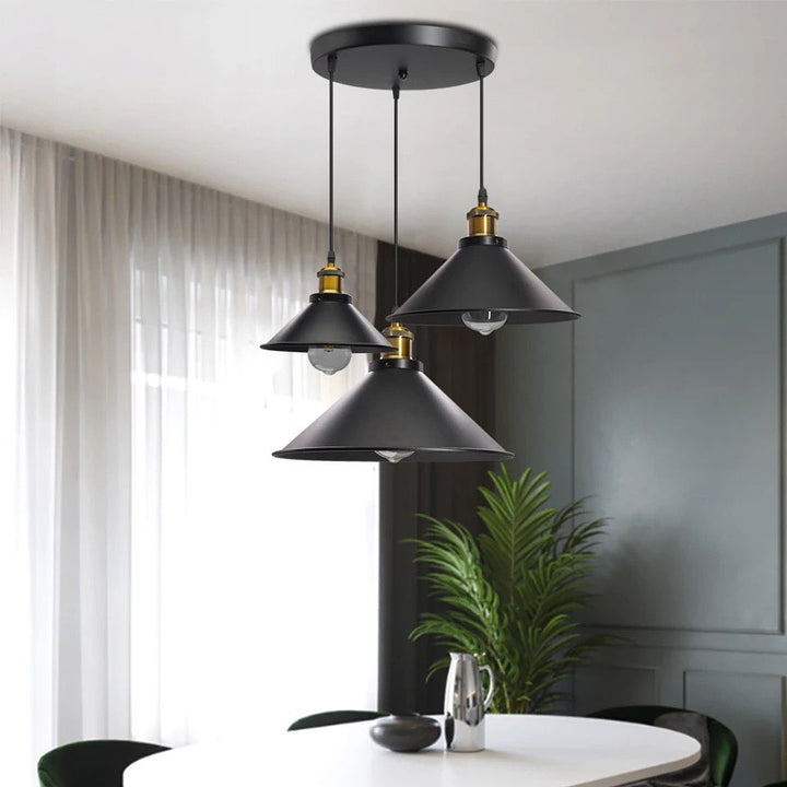 Industrial Pendant Lights with Black Shades and Gold Accents