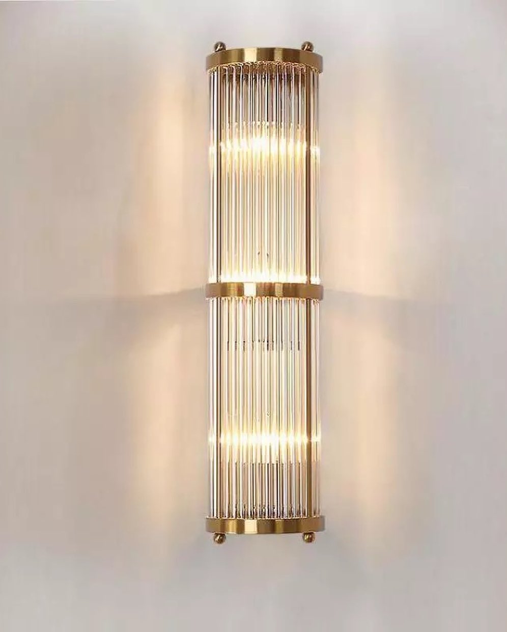 Modern Wall Sconce with Gold Frame and Ribbed Glass