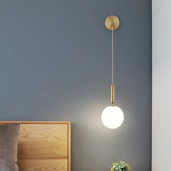 Modern Globe Wall Light with Golden Finish