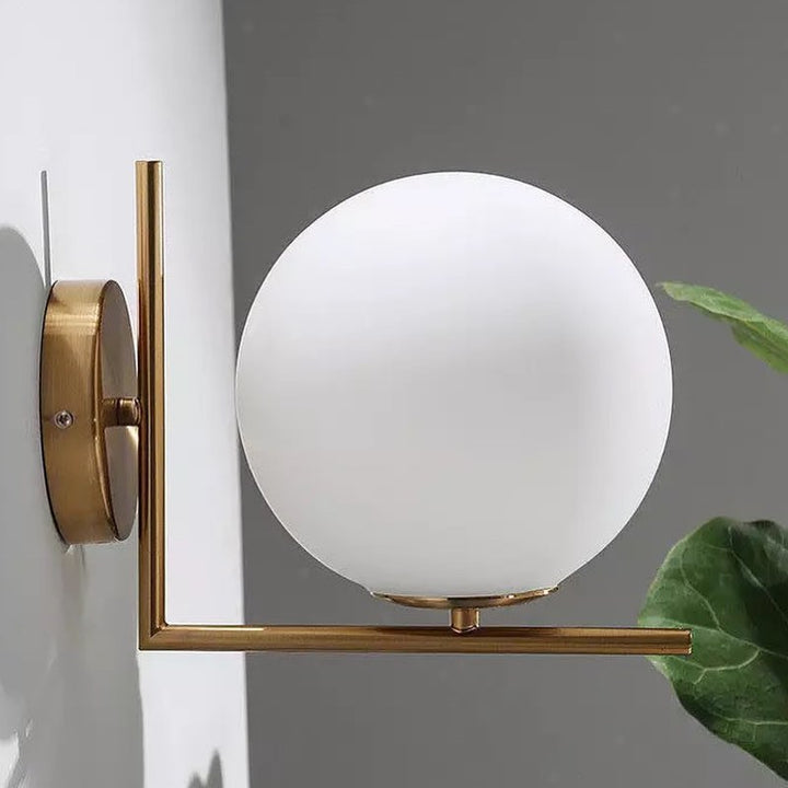 Modern Globe Wall Light with Brass Finish