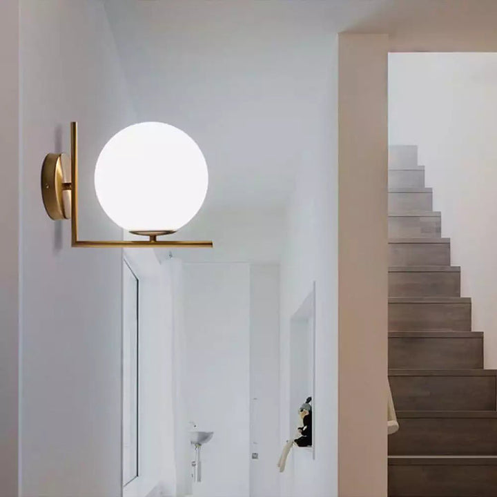 Modern Globe Wall Light with Brass Finish