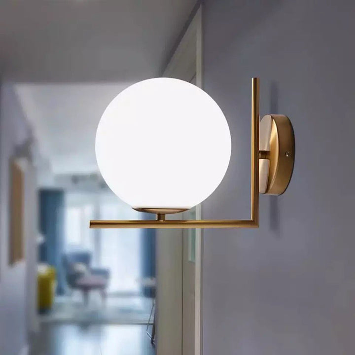 Modern Globe Wall Light with Brass Finish