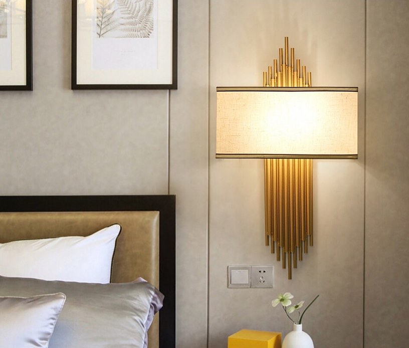 Elegant Wall Sconce with Brass Accents for Bedroom Lighting