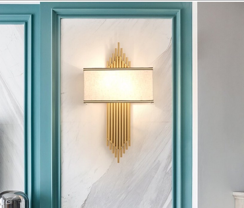 Elegant Wall Sconce with Brass Accents for Bedroom Lighting