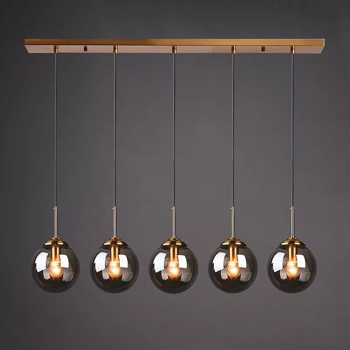 Modern 5-Light Globe Pendant Light with Smoked Glass and Brass Finish