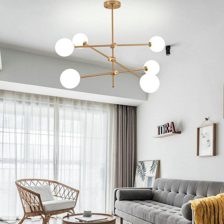 Modern Brass Globe Chandelier with White Glass Shades