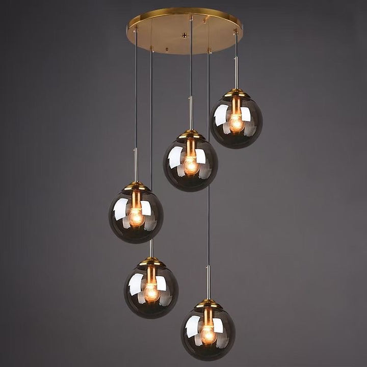 Modern 5-Light Globe Pendant Light with Smoked Glass and Brass Finish