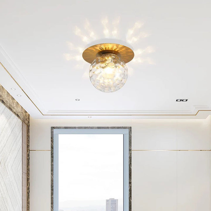 Modern Brass Ceiling Light with Frosted Glass Globe