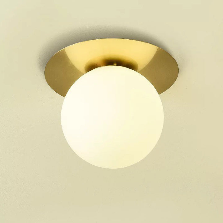 Modern Brass Ceiling Light with Frosted Glass Globe