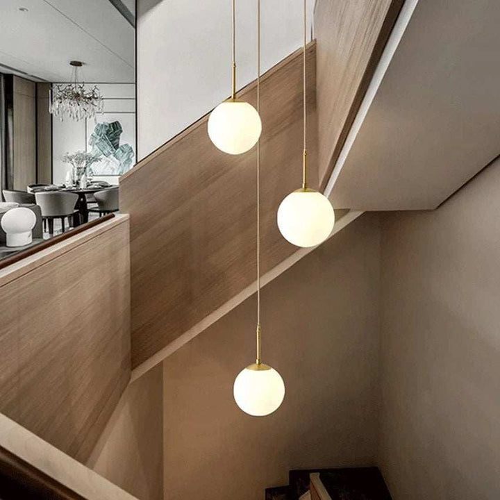 Setthis Modern Globe Pendant Light SetThis modern globe pendant light set feat ...